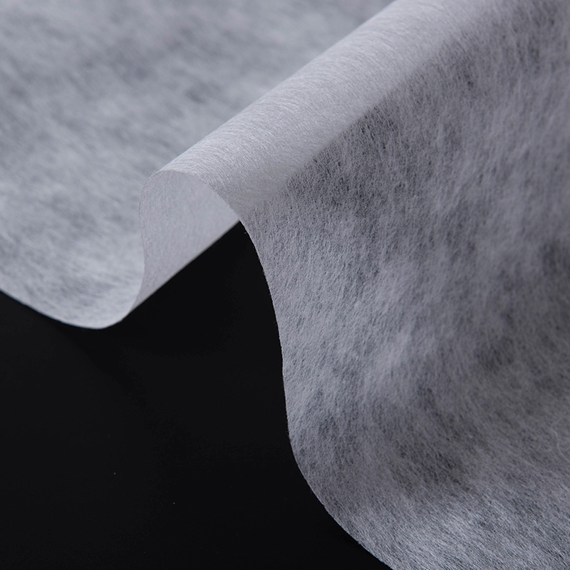 Broderat icke-vävt sammanfogande tyg Broderat icke-vävt sammanfogande tyg