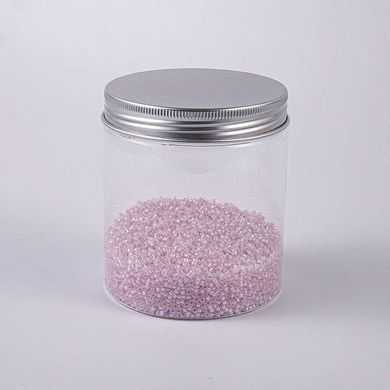 Ljusrosa broderi glaspärlor